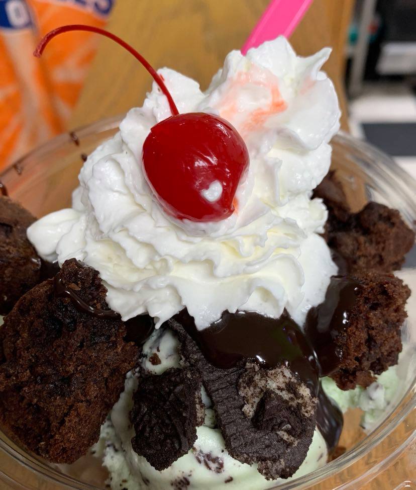 Brownie and Oreo sundae with whipped cream
