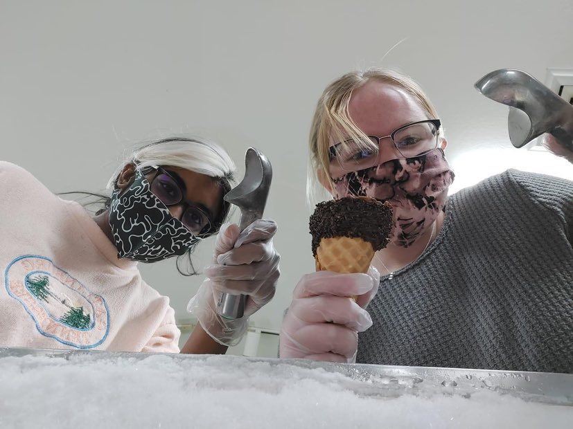 girls scooping ice cream