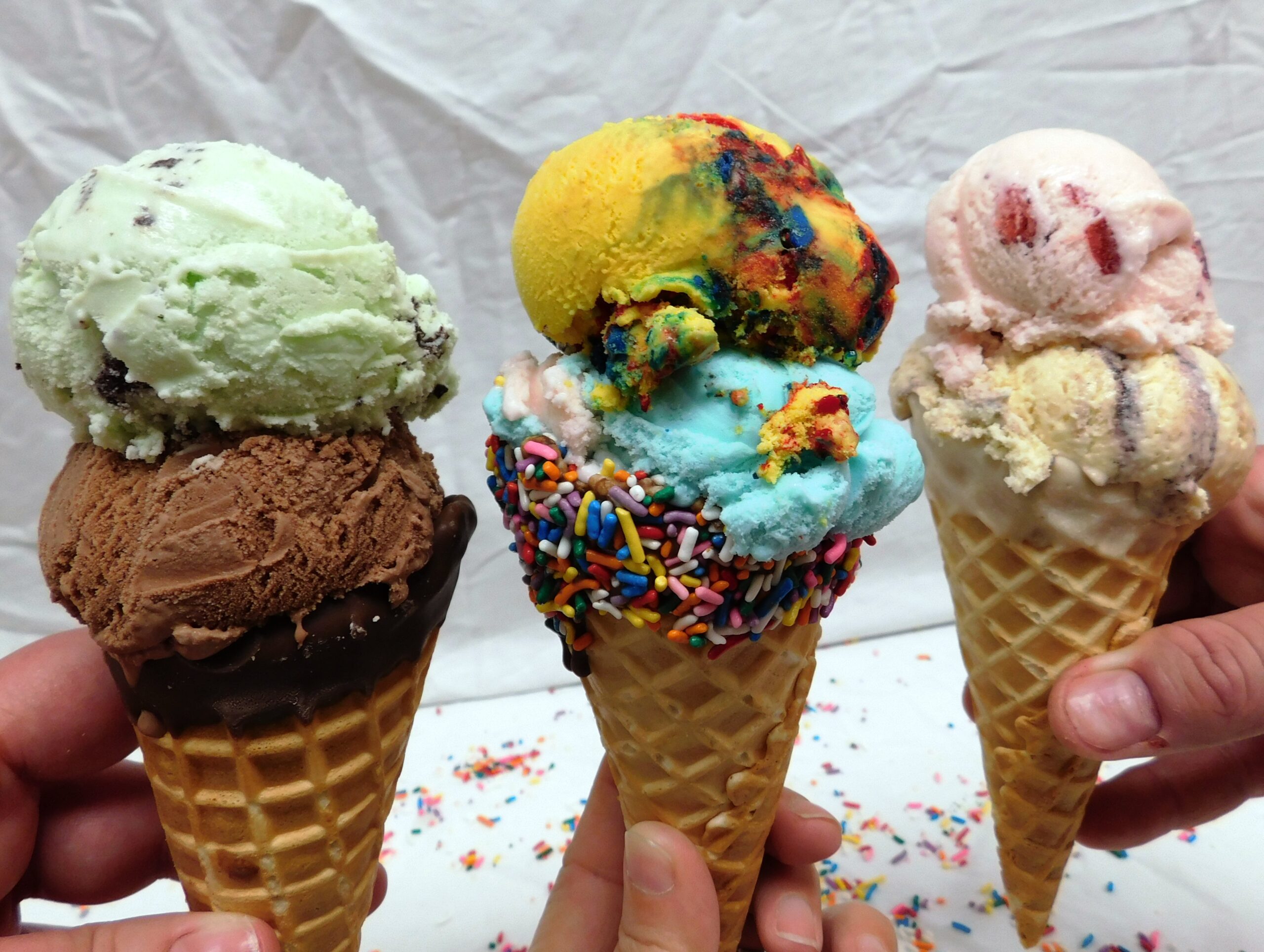 ice cream scoops in decorated waffle cones