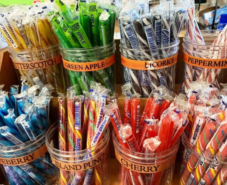 containers of various stick candy