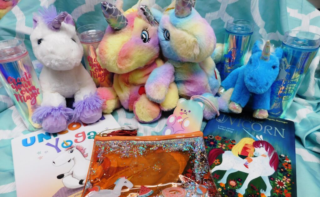 Unicorn books, stuffed animals and accessories